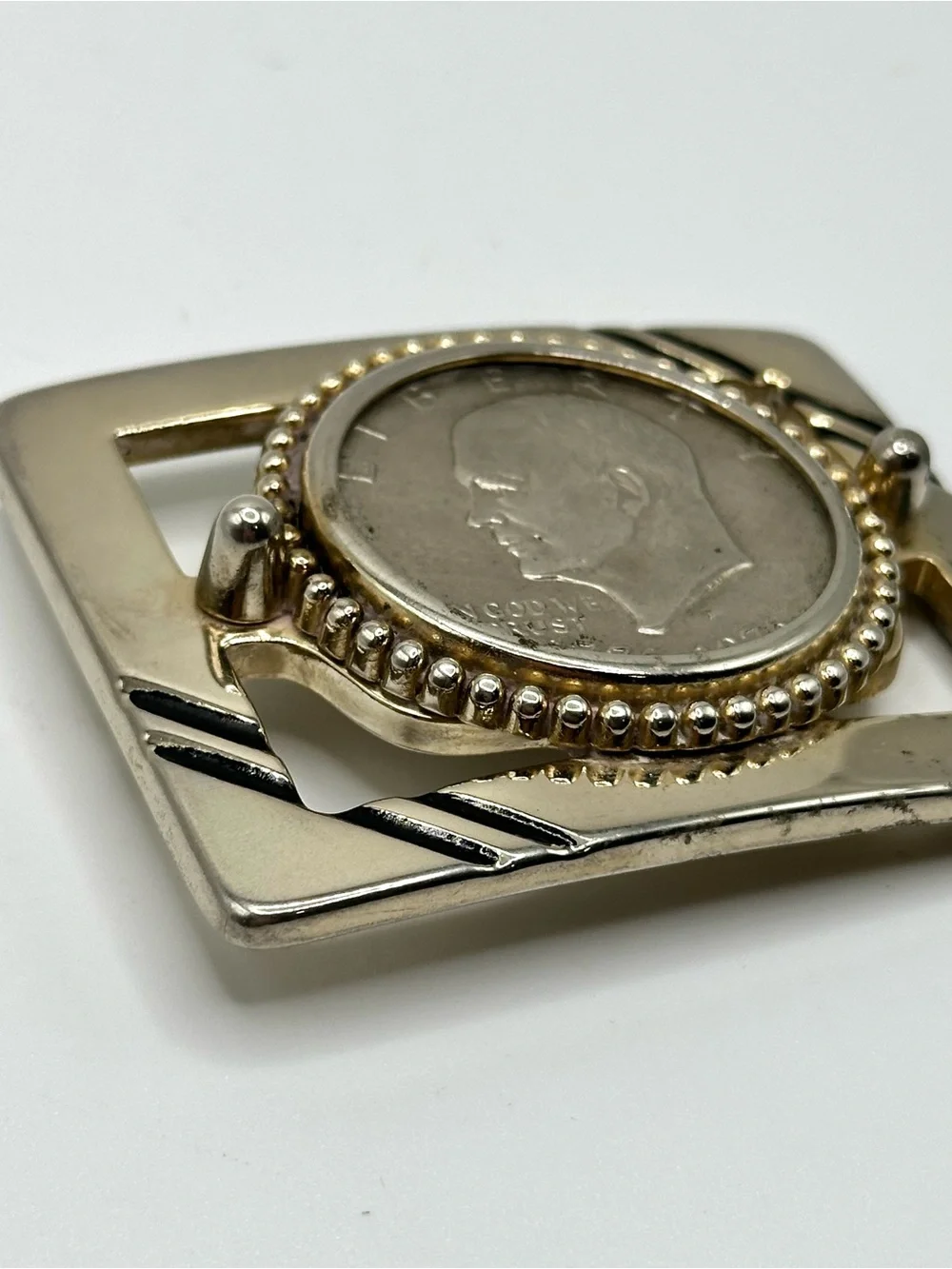 Vintage Eisenhower silver dollar belt buckle.
